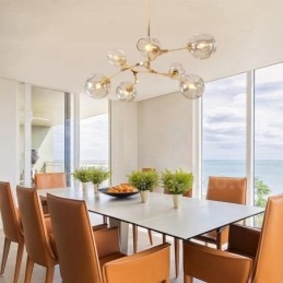 Moderne eigentijdse kroonluchter met 7 lampen en heldere glazen kap en lamp