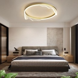 Plafondlamp met golvende rand en ronde inbouw