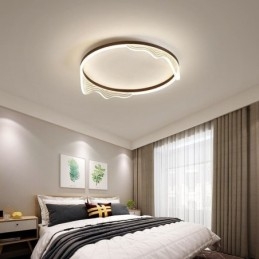 Plafondlamp met golvende rand en ronde inbouw
