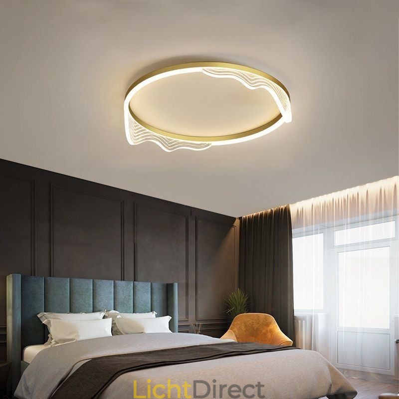 Plafondlamp met golvende rand en ronde inbouw