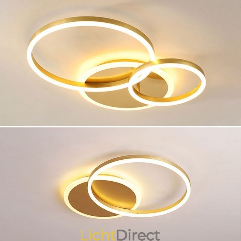 Moderne ronde plafondlamp van goudkleurig materiaal