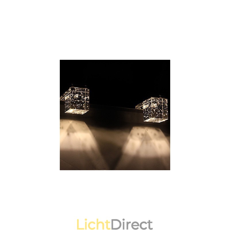 Moderne wandlamp met glazen bubbel kubusvormige kap spiegelfront stijl